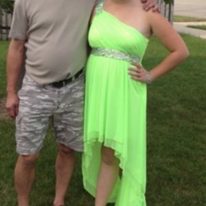 High low formal dress with beaded belt and shoulde